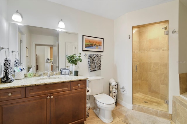 2305 Edgewater Dr Unit 1613, Orlando, FL 32804 - bathroom with vanity, a shower stall, tile patterned flooring, and toilet