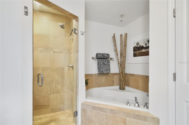 2305 Edgewater Dr Unit 1613, Orlando, FL 32804 - bathroom with a garden tub and a stall shower