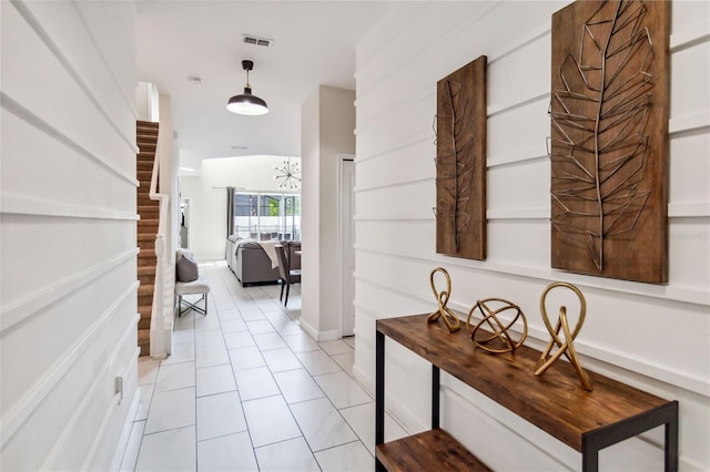 4740 Sleepy Hollow Dr, Kissimmee, FL 34746 - corridor featuring light tile patterned flooring