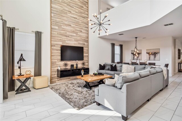 4740 Sleepy Hollow Dr, Kissimmee, FL 34746 - living area with a chandelier and a high ceiling
