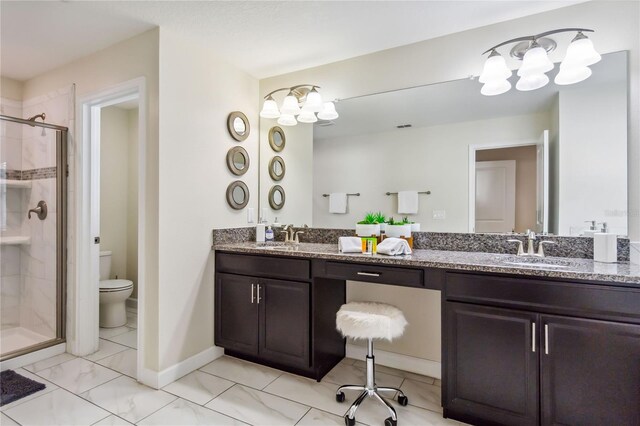4740 Sleepy Hollow Dr, Kissimmee, FL 34746 - full bathroom featuring toilet, a stall shower, double vanity, baseboards, and a chandelier