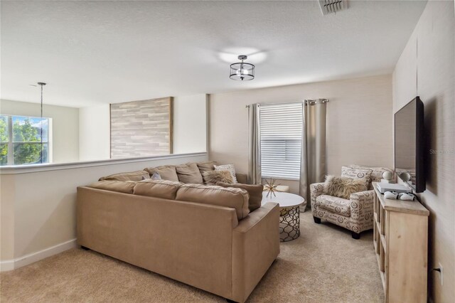 4740 Sleepy Hollow Dr, Kissimmee, FL 34746 - living area with light carpet and baseboards