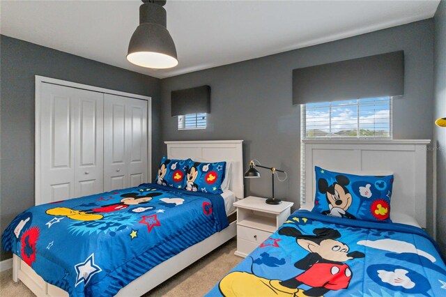 4740 Sleepy Hollow Dr, Kissimmee, FL 34746 - bedroom with carpet floors and a closet