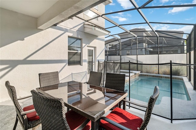 4740 Sleepy Hollow Dr, Kissimmee, FL 34746 - view of pool featuring outdoor dining area, a pool with connected hot tub, a patio, and glass enclosure
