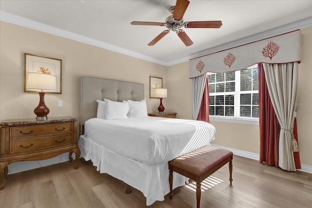 1100 Sunset View Cir Unit 204, Reunion, FL 34747 - bedroom with light wood finished floors, ornamental molding, baseboards, and ceiling fan