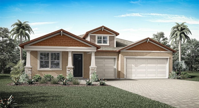 2639 Ginseng Ivy St, Apopka, FL 32703 - craftsman inspired home featuring an attached garage, stucco siding, a front yard, driveway, and stone siding