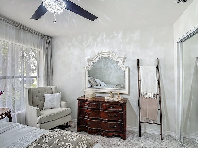 620 Wood Dr, Kissimmee, FL 34759 - bedroom featuring baseboards and ceiling fan