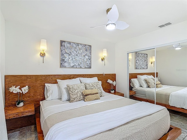 620 Wood Dr, Kissimmee, FL 34759 - bedroom with ceiling fan and a closet