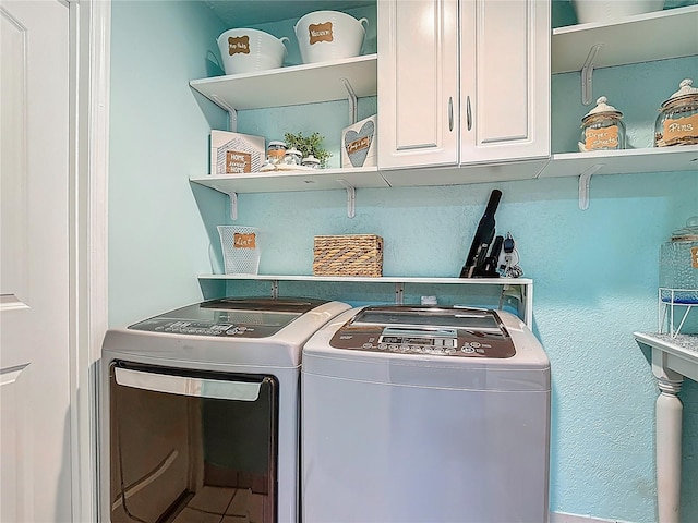 620 Wood Dr, Kissimmee, FL 34759 - washroom with cabinet space and independent washer and dryer