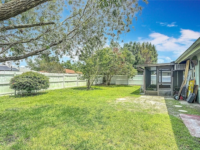 620 Wood Dr, Kissimmee, FL 34759 - view of yard featuring a sunroom
