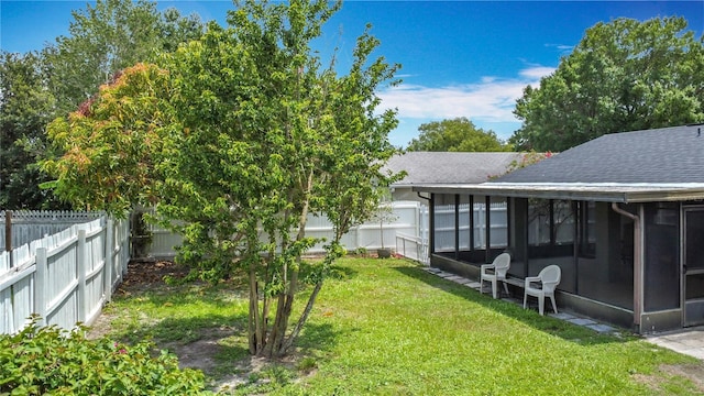 620 Wood Dr, Kissimmee, FL 34759 - view of yard featuring a sunroom