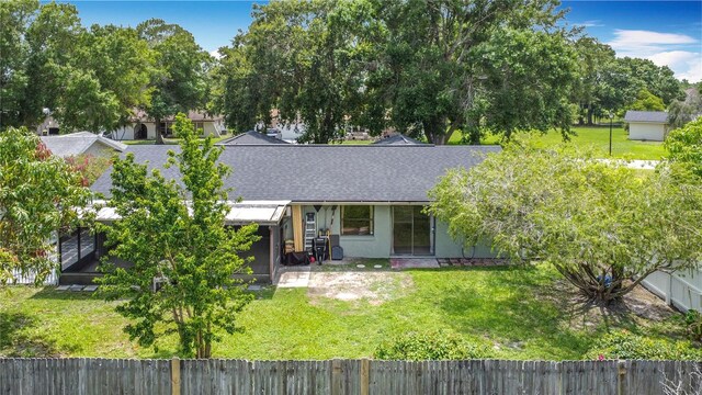 620 Wood Dr, Kissimmee, FL 34759 - view of front of property with roof with shingles and stucco siding