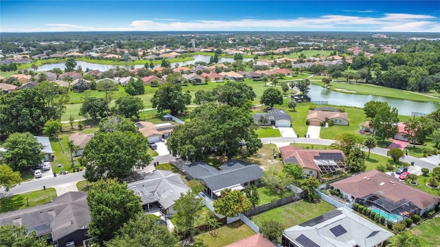 620 Wood Dr, Kissimmee, FL 34759 - aerial view of property and surrounding area with a large body of water and nearby suburban area