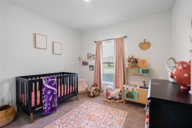 14357 Hidden Ct, Clermont, FL 34711 - bedroom with carpet floors and a crib