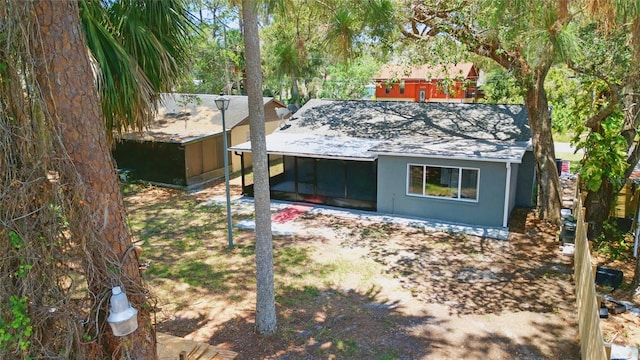 7214 Oakwood Dr, New Port Richey, FL 34652 - view of outdoor structure featuring a sunroom