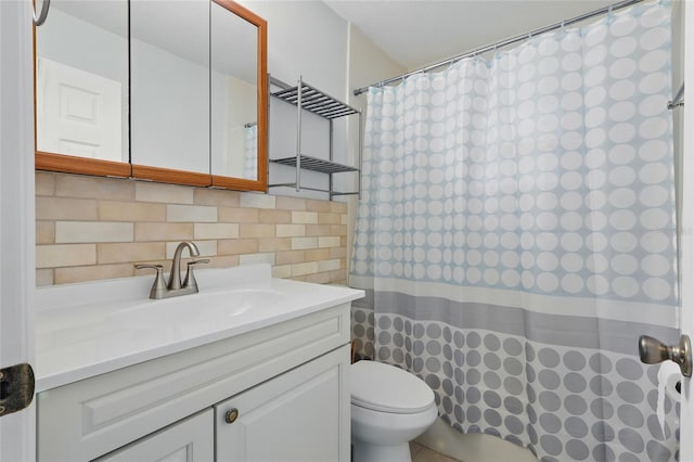7214 Oakwood Dr, New Port Richey, FL 34652 - bathroom with toilet, vanity, backsplash, and curtained shower