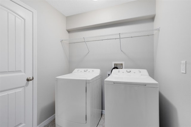 1978 J Lawson Blvd, Orlando, FL 32824 - laundry area with separate washer and dryer and baseboards
