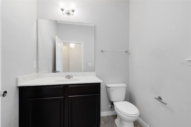 1978 J Lawson Blvd, Orlando, FL 32824 - bathroom with toilet, vanity, and baseboards
