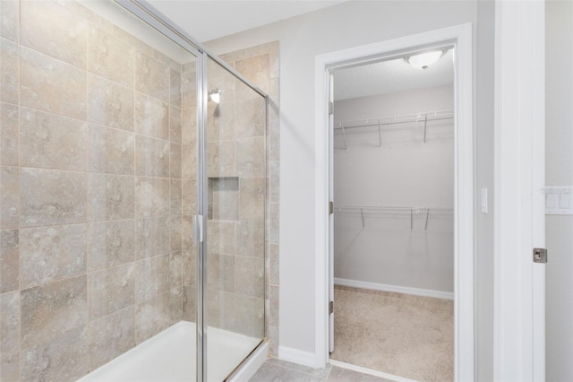 1978 J Lawson Blvd, Orlando, FL 32824 - bathroom with a stall shower and a walk in closet