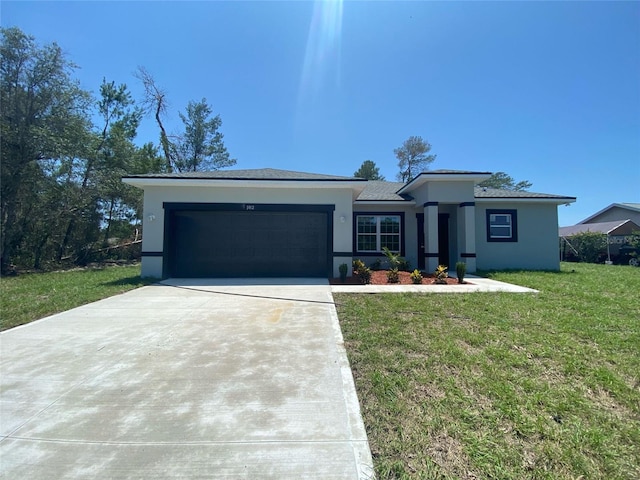 182 Marion Oaks Mnr, Ocala, FL 34473 - view of front of property with a garage, a front yard, concrete driveway, and stucco siding
