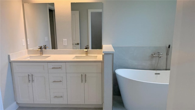 182 Marion Oaks Mnr, Ocala, FL 34473 - full bathroom with double vanity and a freestanding bath
