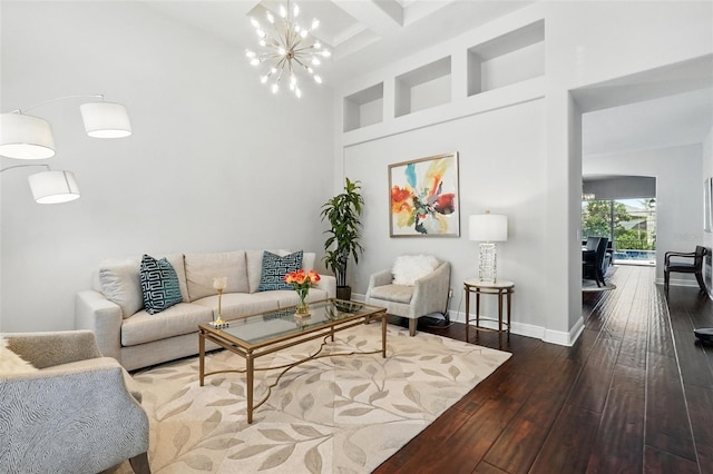 8418 Via Bella Notte, Orlando, FL 32836 - living area featuring hardwood / wood-style flooring, a chandelier, a towering ceiling, baseboards, and beamed ceiling
