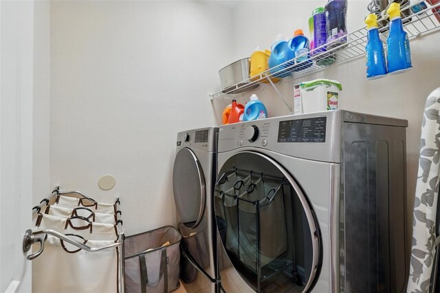 8418 Via Bella Notte, Orlando, FL 32836 - laundry room featuring washer and dryer
