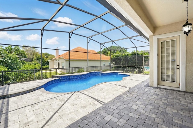 8418 Via Bella Notte, Orlando, FL 32836 - view of pool featuring a patio area and glass enclosure
