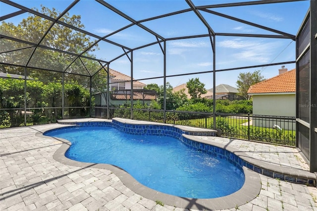 8418 Via Bella Notte, Orlando, FL 32836 - swimming pool featuring a patio area and glass enclosure