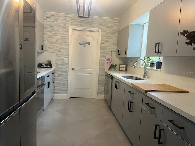 1894 SE Lafayette St, Stuart, FL 34997 - kitchen with a sink, stainless steel appliances, and light countertops
