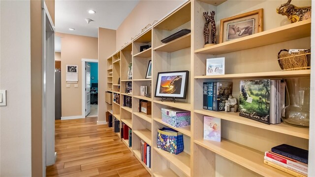 287 Hilltop Dr, Longwood, FL 32750 - corridor with light wood-style flooring and baseboards