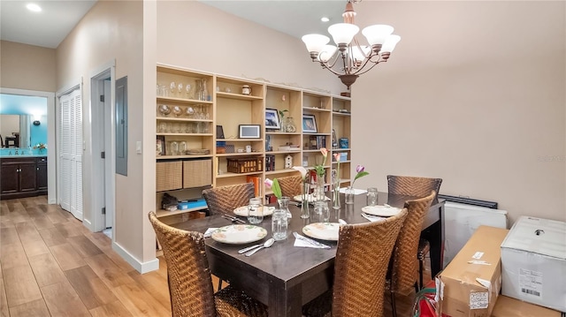 287 Hilltop Dr, Longwood, FL 32750 - dining space featuring light wood-style flooring, a chandelier, baseboards, and recessed lighting