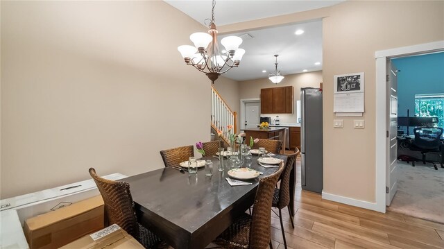 287 Hilltop Dr, Longwood, FL 32750 - dining area featuring light wood-style floors, stairs, a chandelier, baseboards, and recessed lighting