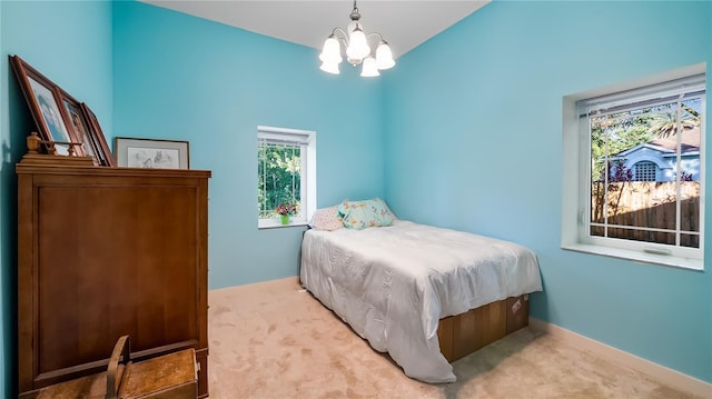 287 Hilltop Dr, Longwood, FL 32750 - carpeted bedroom featuring a chandelier and baseboards