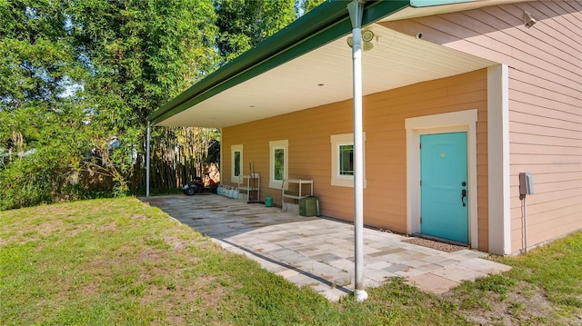 287 Hilltop Dr, Longwood, FL 32750 - exterior space with a lawn, a patio, and an attached carport