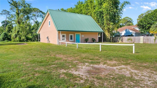 287 Hilltop Dr, Longwood, FL 32750 - back of house featuring metal roof