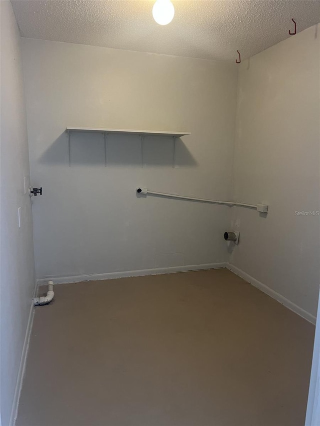 460 Sand Lime Rd, Winter Garden, FL 34787 - washroom with a textured ceiling and baseboards