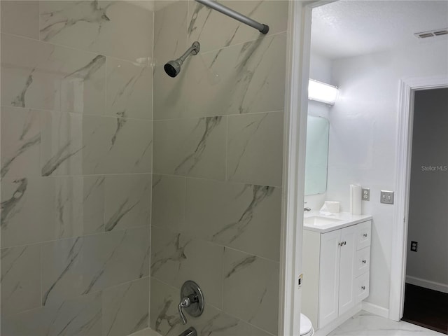 909 San Paulo Way, Kissimmee, FL 34758 - full bathroom with vanity, tub / shower combination, toilet, and marble finish flooring