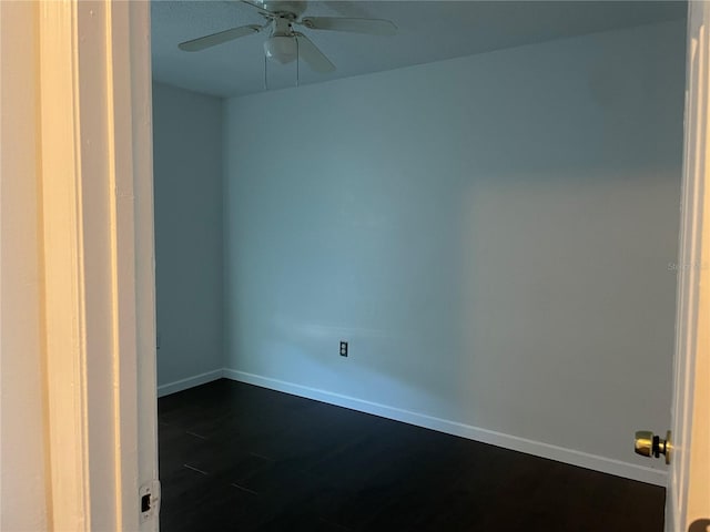 909 San Paulo Way, Kissimmee, FL 34758 - empty room featuring ceiling fan, dark wood-style floors, and baseboards