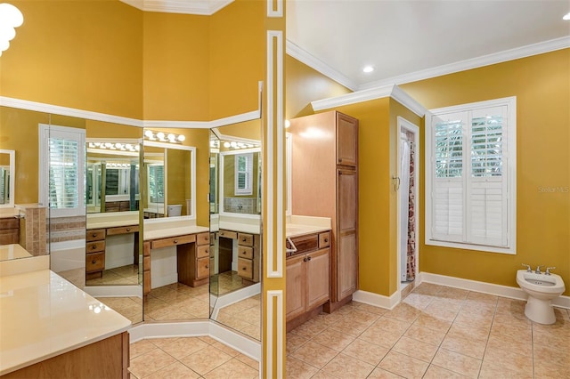 914 Elysium Blvd, Mount Dora, FL 32757 - full bath with a bidet, vanity, tile patterned flooring, crown molding, and recessed lighting