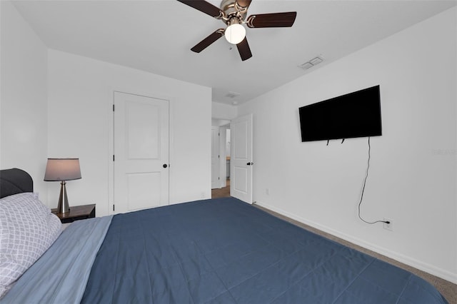 2210 Derwent Dr, Davenport, FL 33896 - bedroom featuring baseboards and a ceiling fan