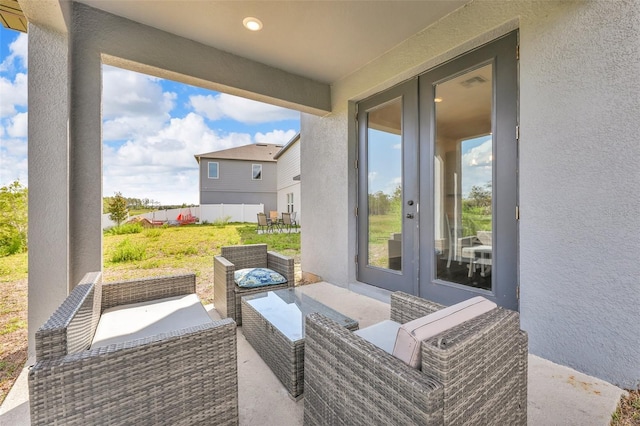 2210 Derwent Dr, Davenport, FL 33896 - view of patio with an outdoor hangout area and french doors