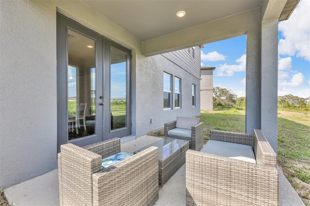 2210 Derwent Dr, Davenport, FL 33896 - view of patio featuring french doors and outdoor lounge area