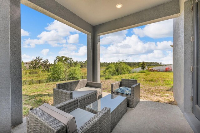 2210 Derwent Dr, Davenport, FL 33896 - view of patio with an outdoor living space