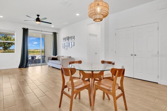 3280 Canna Lily Pl, Clermont, FL 34711 - dining space featuring recessed lighting, a ceiling fan, baseboards, and a chandelier