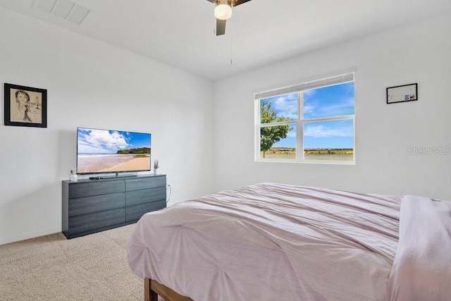 3280 Canna Lily Pl, Clermont, FL 34711 - bedroom with carpet floors and ceiling fan