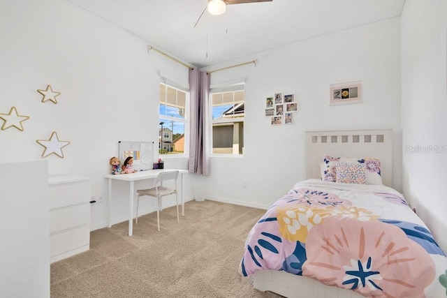 3280 Canna Lily Pl, Clermont, FL 34711 - carpeted bedroom with a ceiling fan and baseboards
