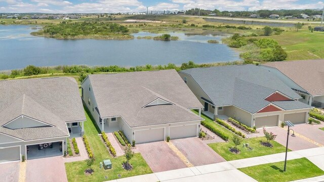3280 Canna Lily Pl, Clermont, FL 34711 - aerial view of property and surrounding area with a large body of water
