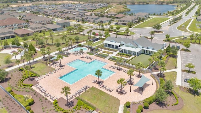 3280 Canna Lily Pl, Clermont, FL 34711 - drone / aerial view of a pool area and a large body of water