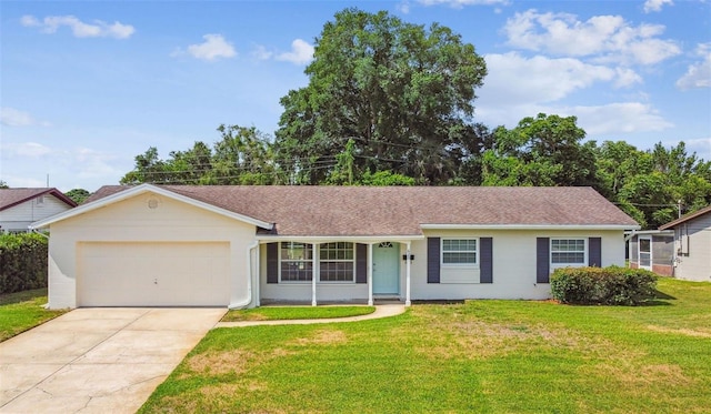 620 Marshall St, Altamonte Springs, FL 32701 - ranch-style house with driveway, a garage, and a front lawn